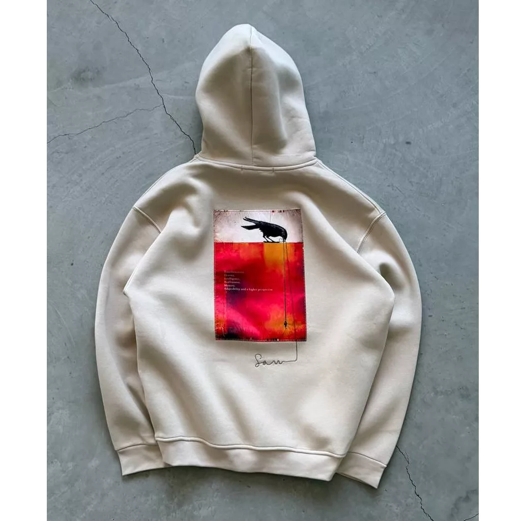 هودی طرح کلاغ برند SAW رنگ کرم